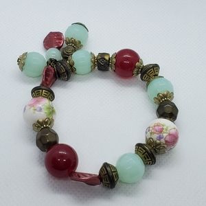 Teal, red and flower beads stretch bracelet